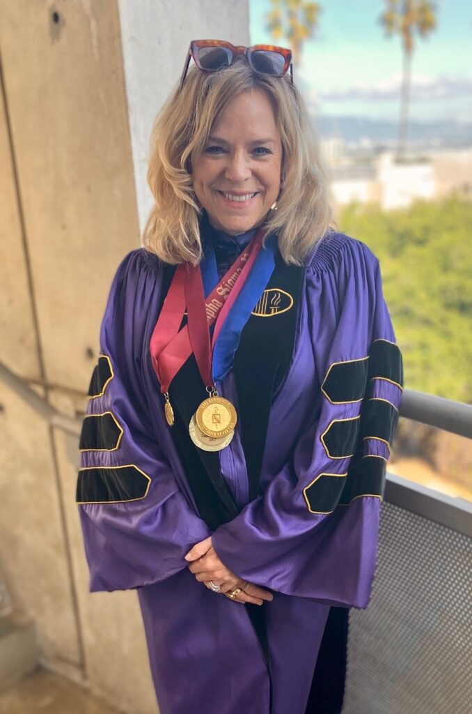 Ellen Ensher graduation gown and medals